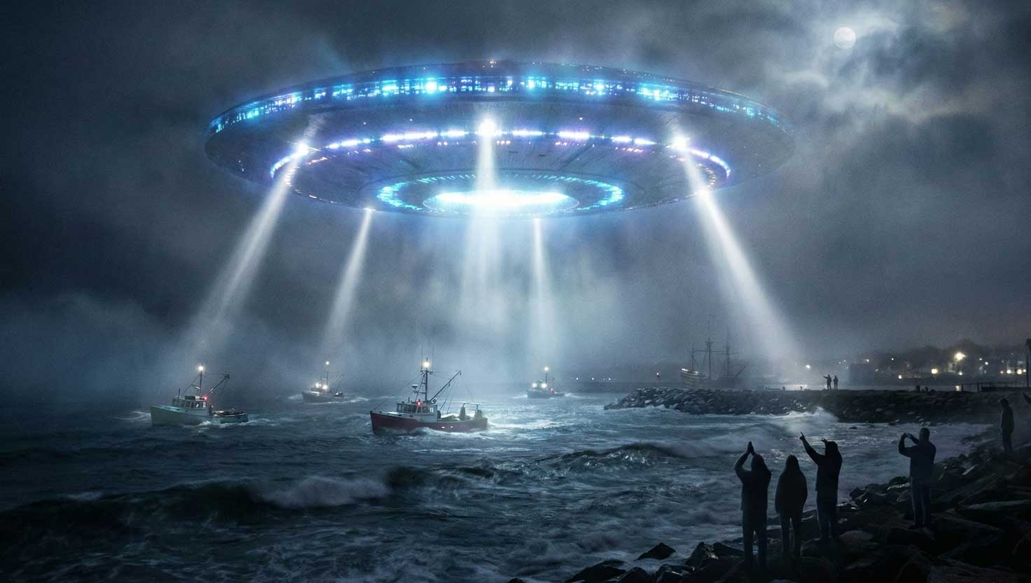 A glowing UFO hovers above Plymouth Harbor, shining beams onto fishing boats as fog and water reflect its bright light.